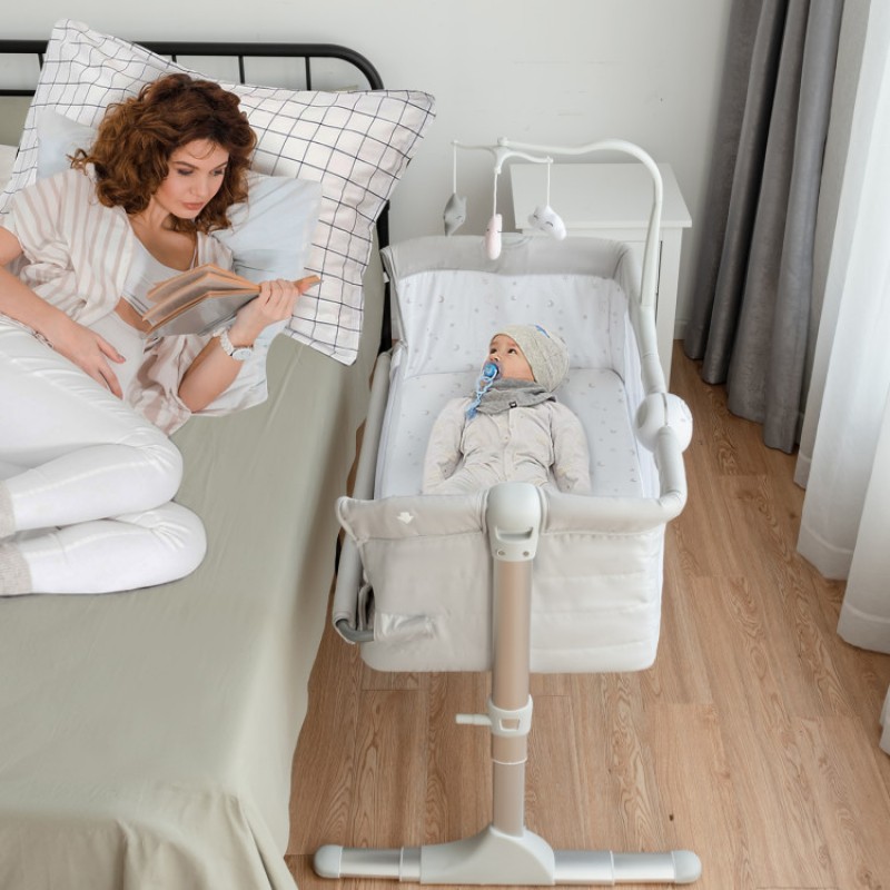 Height Adjustable Baby Side Crib with Music Box & Toys Height Adjustable Baby Side Crib with Music Box & Toys